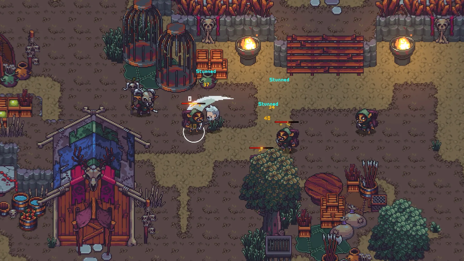 A lantern-lit outdoor area with buildings and scattered supplies in Emberville.